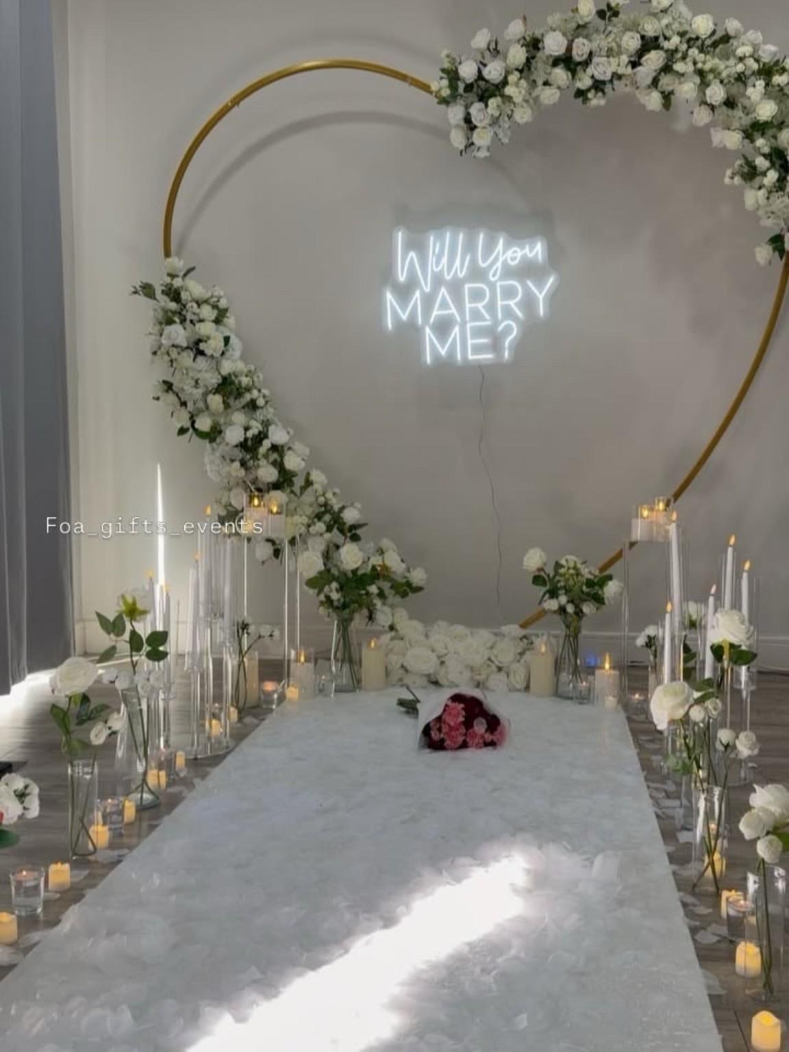 White floral heart with illuminated proposal wording as a styling reference