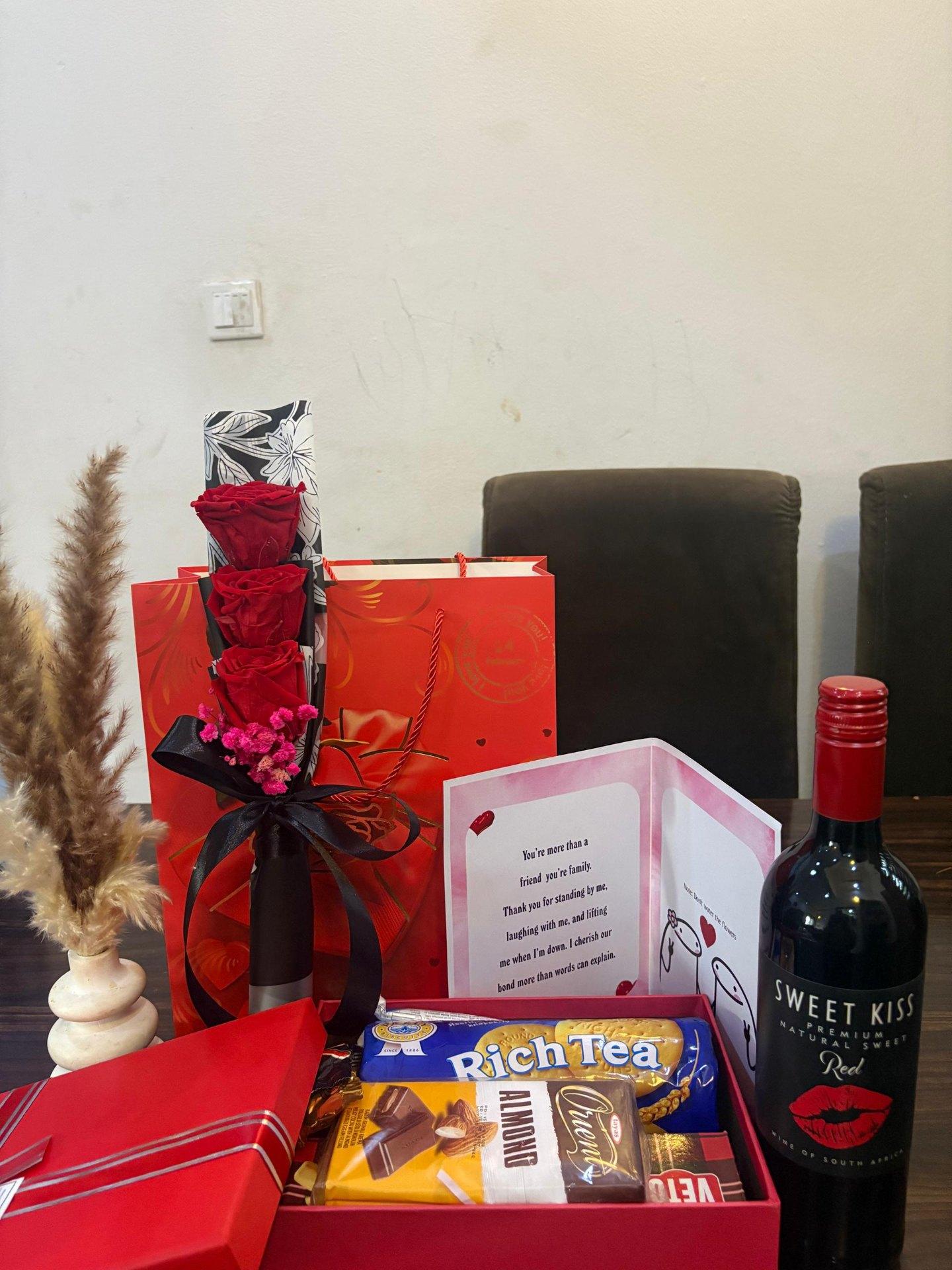 Gift box with wine and sweets beautifully presented
